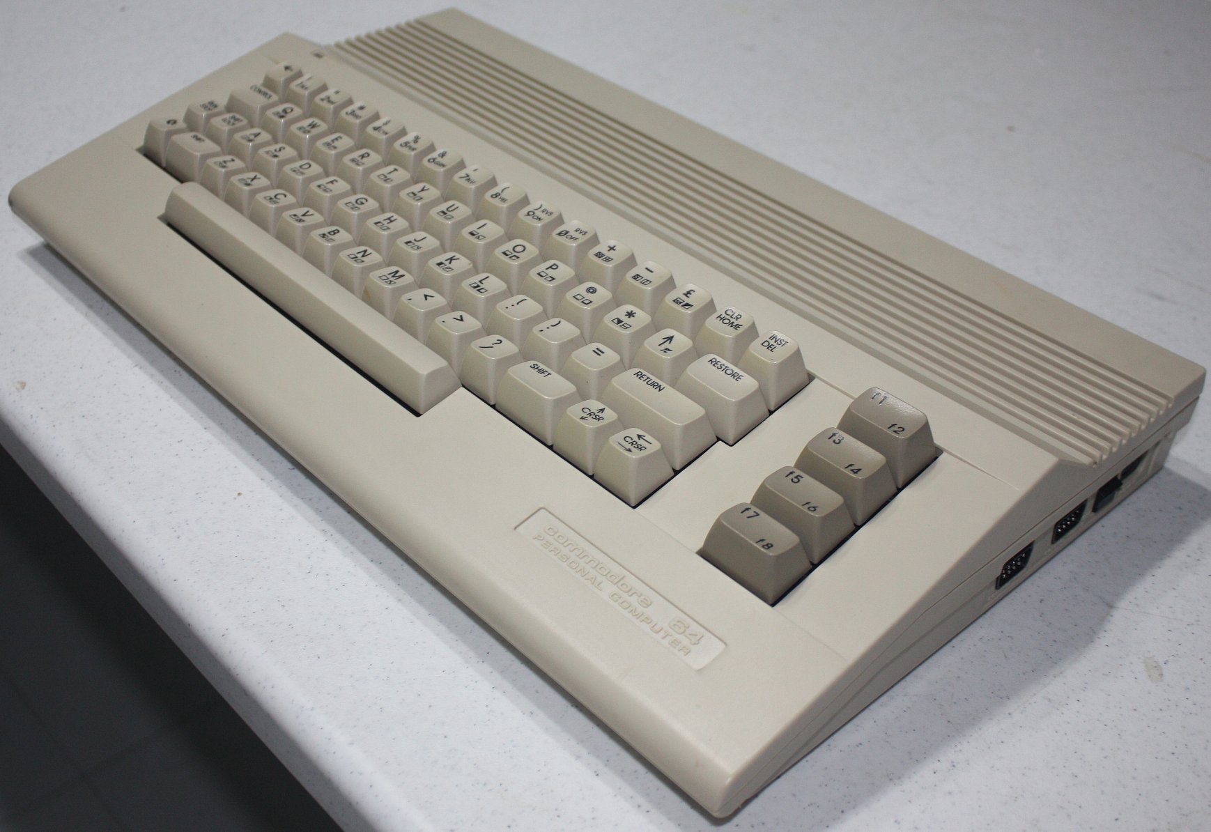 c64cMineEmbossedRHS-1-HB5085590E.jpg