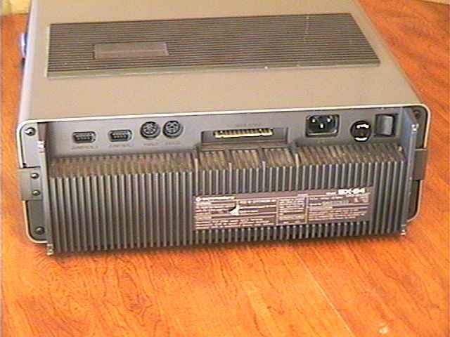 sx-64PortsFrmBackOnWood.jpg